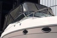 Photo of Chaparral 270 Signature No Arch, 2007: Bimini Top, Front Connector, Side Curtains, Camper Top, Camper Side and Aft Curtains, viewed from Starboard Front 