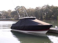 Photo of Pursuit ST 310 Sport 20xx TTopCover™ T-Top boat cover in Water, viewed from Starboard Front 