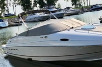 Photo of Regal 2350 LSC, 2001: Bimini Top in Boot, Cockpit Cover, viewed from Starboard Front 