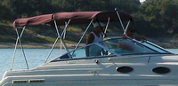 Photo of Regal Commodore 256, 1995: Bimini Top, Camper Top red, viewed from Starboard Side 