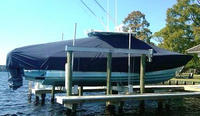 Photo of Regulator 34FS 20xx TTopCover™ T-Top boat cover on Lift, viewed from Starboard Side 