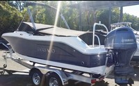 Photo of Robalo 207DC, 2017 R207 Bimini Top in Boot, Bow Cover Cockpit Cover, viewed from Port Rear 