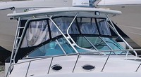 Photo of Robalo 305WA, 2009: Hard-Top, Front Connector, Side Curtains, Aft Curtain, viewed from Starboard Front 