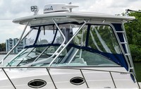 Photo of Robalo 305WA, 2016: Hard-Top, Front Connector, Side Curtains, viewed from Port Front closeup 