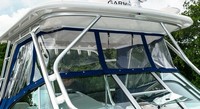 Photo of Robalo 305WA, 2016: Hard-Top, Front Connector, Side Curtains, viewed from Starboard Front closeup 