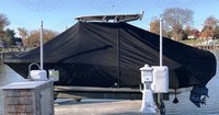 Photo of Scout 215XSF 20xx T-Top Boat-Cover On Lift, viewed from Port Side 