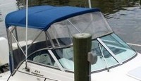 Photo of Aquasport 215 Explorer, 2000: Bimini Top, Front Connector, Side Curtains, Aft-Drop-Curtain, viewed from Starboard Front 