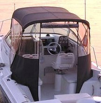Photo of Aquasport 215 Explorer, 2003: Bimini Top, Front Connector, Side Curtains, Aft-Drop-Curtain, viewed from Port Rear 