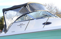 Photo of Aquasport 215 Explorer, 2004: Bimini Top, Front Connector, Side Curtains, Aft-Drop-Curtain, viewed from Starboard Side 