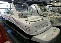 Photo of Baja 335 Performance Arch, 2008: Bimini Top in Boot Arch Sunshade Top, Camper Top in Boot, viewed from Port Rear 