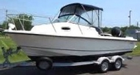 Photo of Boston Whaler Conquest 205 2006: Bimini Top, Front Visor, Side Curtains, Aft-Drop-Curtain, viewed from Port Front 