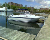 Photo of Boston Whaler Conquest 21, 1998: Factory OEM Bimini Top, viewed from Starboard Front 