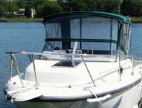 Photo of Boston Whaler Conquest 21 1999: Factory Bimini Top, Front Visor, Side and Aft Curtains, viewed from Port Front 