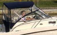 Photo of Boston Whaler Conquest 235, 2010: Bimini Top, Connector, Side Curtains, Aft-Drop-Curtain, viewed from Starboard Side 
