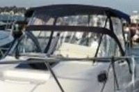 Photo of Boston Whaler Conquest 235, 2011: Bimini Top, Connector, Side Curtains, Aft-Drop-Curtain, viewed from Port Front 