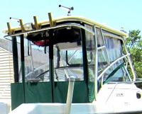 Photo of Boston Whaler Conquest 23 1999: Hard-Top, Visor, Side Curtains, Aft-Drop-Curtain, viewed from Starboard Rear 