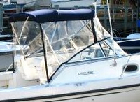 Photo of Boston Whaler Conquest 23, 2000: Bimini Top, Visor, Side Curtains, viewed from Starboard Side 