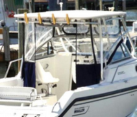 Photo of Boston Whaler Conquest 23, 2000: Hard-Top, Visor, Side Curtains, Aft-Drop-Curtain, viewed from Starboard Rear 