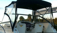Photo of Boston Whaler Conquest 255, 2002: Bimini Top, Front Visor, Side Curtains, viewed from Port Rear 