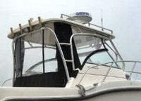 Photo of Boston Whaler Conquest 255, 2004: Hard-Top, Side Curtains, Aft-Drop-Curtain, viewed from Starboard Rear 