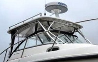 Photo of Boston Whaler Conquest 255, 2004: Hard-Top, Visor and Side Curtains, viewed from Starboard Front 