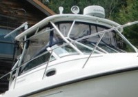 Photo of Boston Whaler Conquest 275, 2004: Hard-Top, Visor, Side Cutains, viewed from Starboard Front 