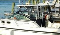 Photo of Boston Whaler Conquest 28, 1999: Factory OEM Hard-Top, Visor Enclosure Curtains on the water 