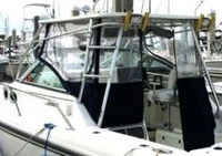 Photo of Boston Whaler Conquest 28, 1999: Factory OEM Hard-Top, Visor Enclosure Curtains 2, viewed from Port Rear 