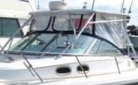 Photo of Boston Whaler Conquest 28, 2000: Hard-Top, Front Visor, Side Curtains, Aft-Drop-Curtain, viewed from Port Front 
