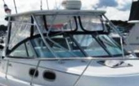 Photo of Boston Whaler Conquest 28, 2000: Hard-Top, Front Visor, Side Curtains, Aft-Drop-Curtain, viewed from Starboard Front 
