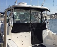 Photo of Boston Whaler Conquest 315 Open, 2014: Hard-Top, Side Curtains, Aft-Drop-Curtain, viewed from Port Rear 