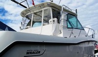 Photo of Boston Whaler Conquest 345, 2010: Hard-Top Aft-Drop-Curtains, Aft and, Side Hard-Top Curtain Connections White Stamoid, viewed from Starboard Rear 