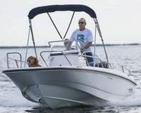 Photo of Boston Whaler Dauntless 170, 2013: Bimini Top in Boot (Factory OEM website photo), viewed from Port Front 