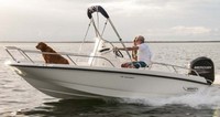 Photo of Boston Whaler Dauntless 170 2013: Bimini Top in Boot (Factory OEM website photo), viewed from Starboard Side 