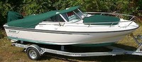 Photo of Boston Whaler Dauntless 17 1997:, Bow Cover Cockpit Cover to Top of WindShield Forest Green Sunbrella, viewed from Starboard Front 