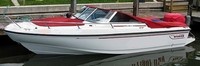 Photo of Boston Whaler Dauntless 17, 1997: Bow Cover Cockpit Cover to Top of WindShield Jockey Red Sunbrella, viewed from Port Front 