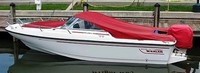 Photo of Boston Whaler Dauntless 17, 1997: Bow Cover Cockpit Cover to Top of WindShield Jockey Red Sunbrella, viewed from Port Side 