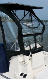 Photo of Boston Whaler Dauntless 180, 2003: Montauk T-Topless™ Folding T-Top and Spray-Shield, viewed from Starboard Front 