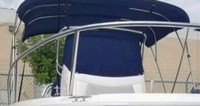 Photo of Boston Whaler Dauntless 210 2016: Bimini Top Console Reversible Pilot Seat Cover No T-Top, viewed from Starboard Front 