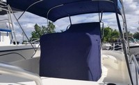 Photo of Boston Whaler Dauntless 210 2016: Bimini Top Console Reversible Pilot Seat Cover No T-Top, viewed from Starboard Rear 