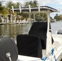 Photo of Boston Whaler Dauntless 210 2017 Canvas T-Top Console-Cover T-Top Reversible Pilot Seat Cover, viewed from Starboard Rear 