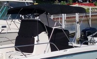 Photo of Boston Whaler Dauntless 210 2018 Bimini Top Console Reversible Pilot Seat Cover No T-Top, viewed from Port Front 