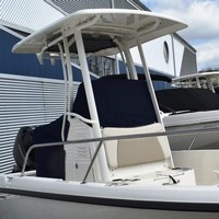 Photo of Boston Whaler Dauntless 210 2019 Factory Hard-Top Console Reversible Pilot Seat Cover T-Top, viewed from Starboard Front 