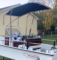 Photo of Boston Whaler Montauk 17 1979 Montauk T-Topless™ Folding T-Top 2 viewed from Port Rear 