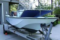 Photo of Boston Whaler Montauk 17 1985: Montauk T-Topless™ Folding T-Top Lowered, viewed from Starboard Front 