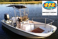 Photo of Boston Whaler Montauk 17 19xx Montauk T-Topless™ Folding T-Top (MT2) on the water, viewed from Starboard Front 