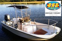 Photo of Boston Whaler Montauk 17 19xx Montauk T-Topless™ Folding T-Top (MT2) on the water, viewed from Starboard Front 800x 