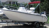 Photo of Boston Whaler Outrage 18, 2000: Bimini Top in Boot, viewed from Port Front 