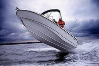 Photo of Boston Whaler Outrage 210, 2002: Bimini Top (Factory OEM website photo) jumping waves 