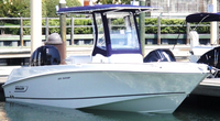 Photo of Boston Whaler Outrage 220 2011: Factory T-Top, Visor, Side Curtains, viewed from Port Front 